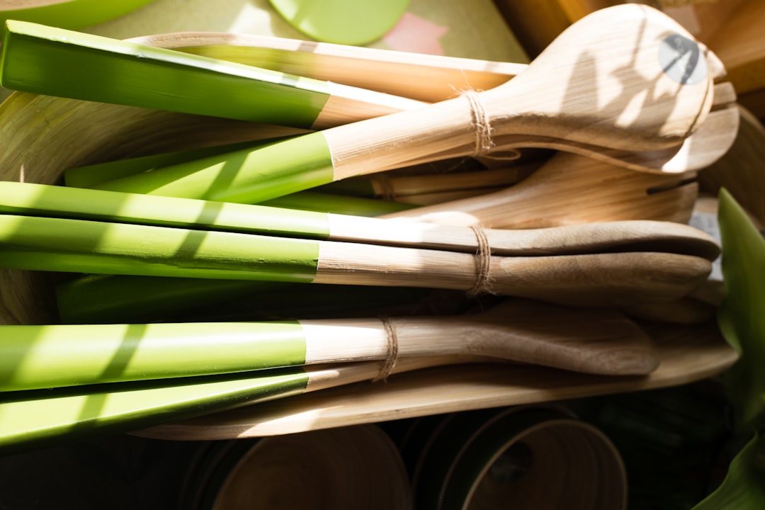 Wooden salad servers with green painted handles